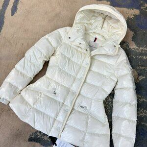 Arc'teryx women's down jacket, light pink, fitted waist